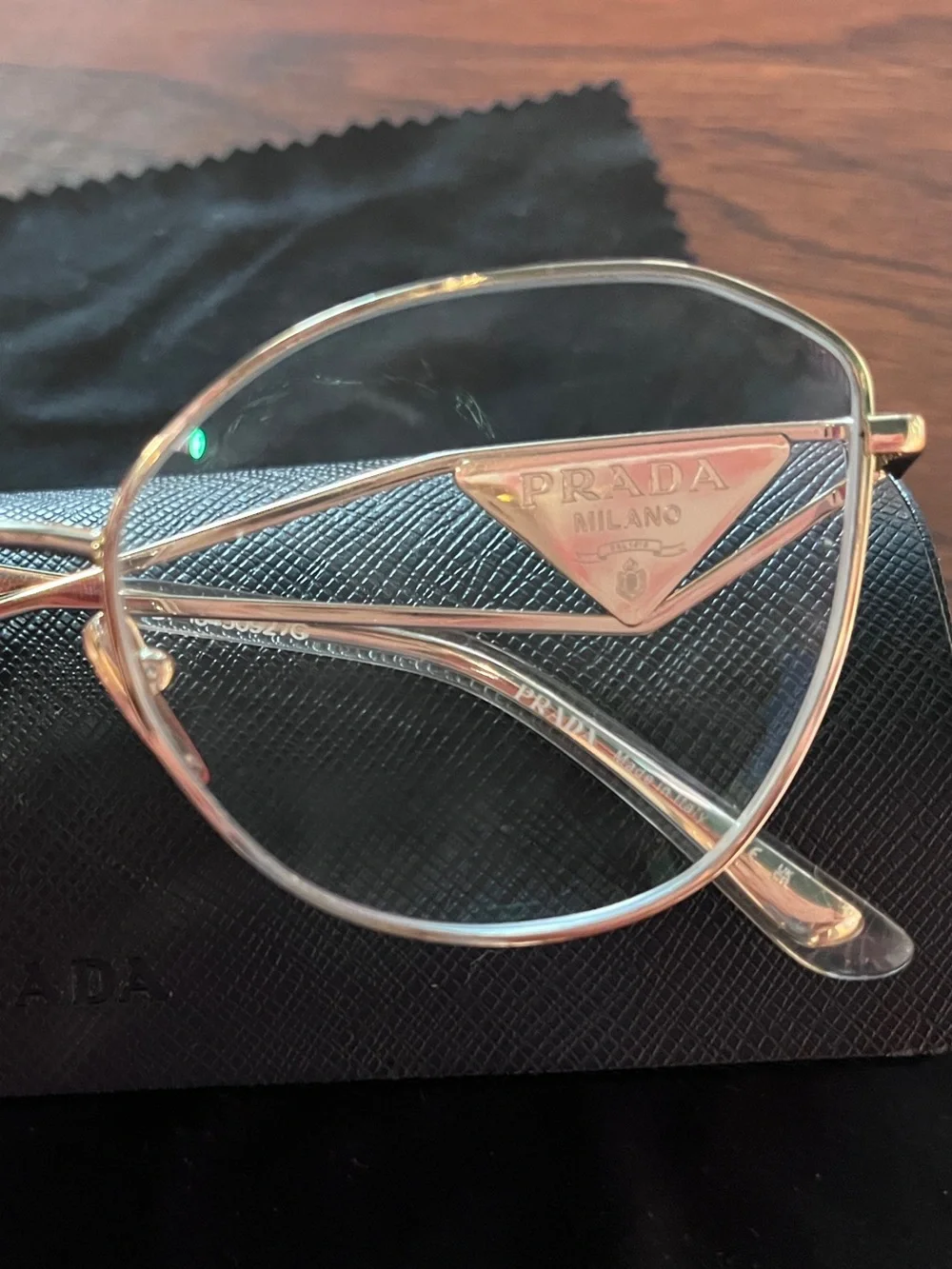 Prada - eyeglass frames - PR 52ZV - pale gold